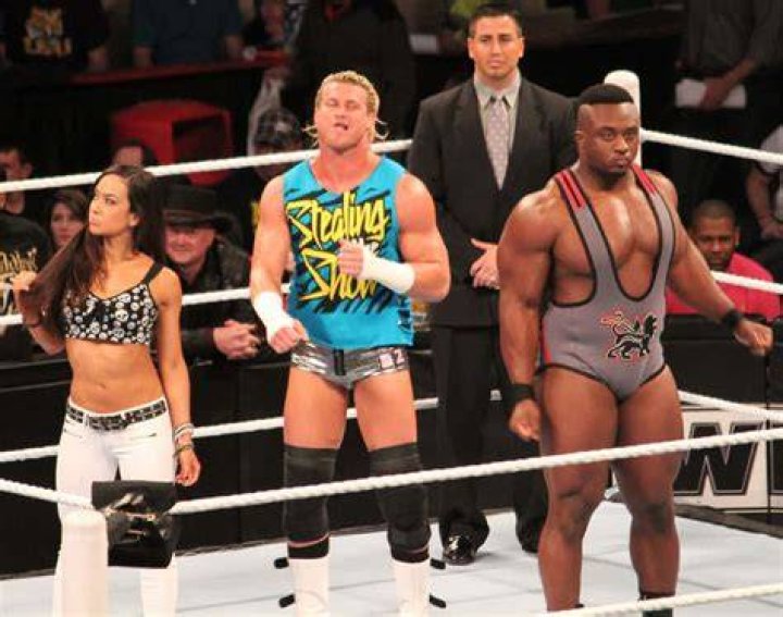 Big E with Dolph Ziggler over his head