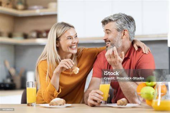 cheerful man having snack