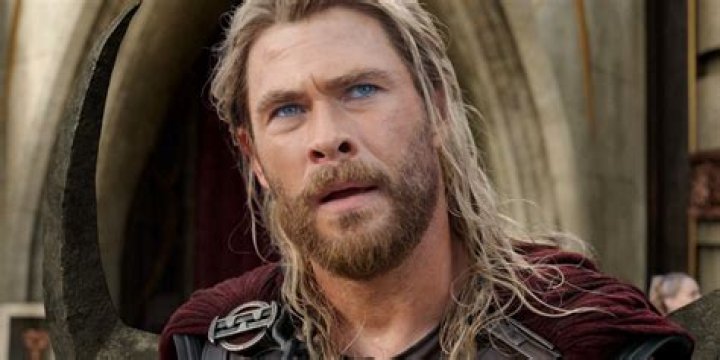 Chris Hemsworth looking up while underwater in Extraction