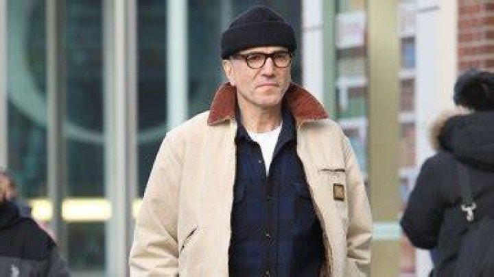 Daniel Day Lewis walking among graves in Phantom Thread