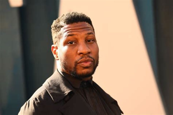 Jonathan Majors on Plane in Devotion