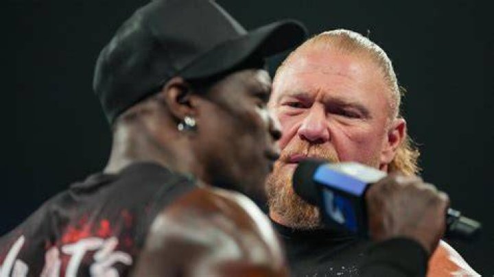 R truth makes brock lesnar laugh