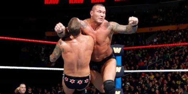 Randy Orton Clotheslines CM Punk