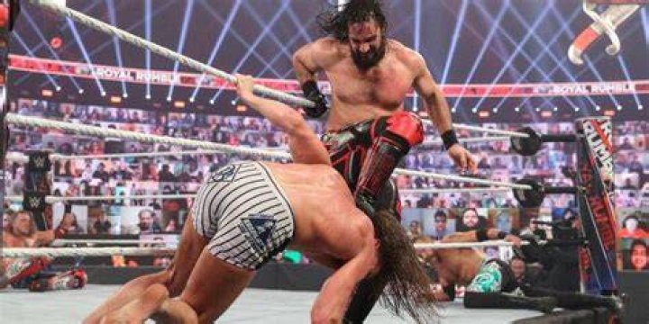 Riddle being Stomped by Seth Rollins Cropped