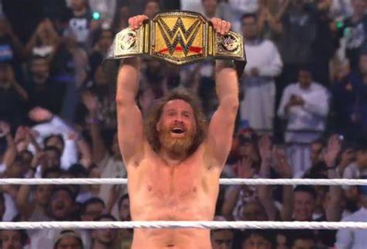 Sami Zayn put through a table 