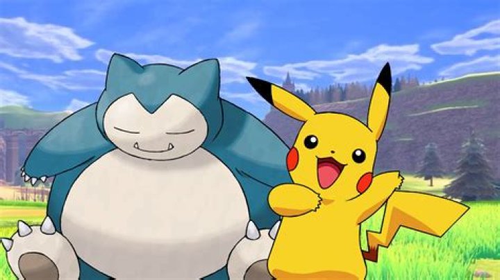 Snorlax sleeping together with Pikachu amongst fallen autumn leaves