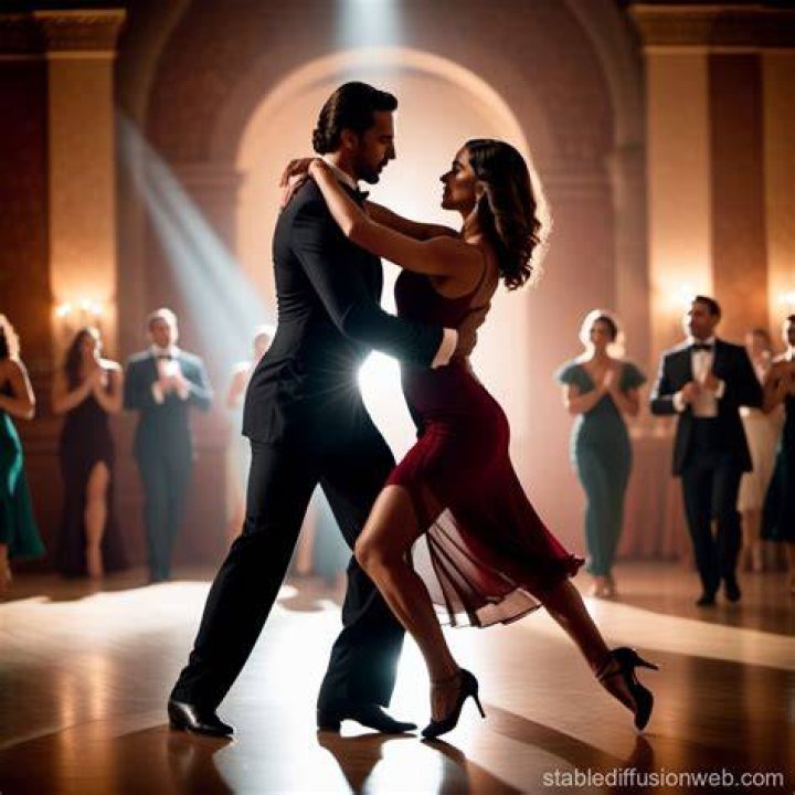 Two people dancing tango on the dance floor