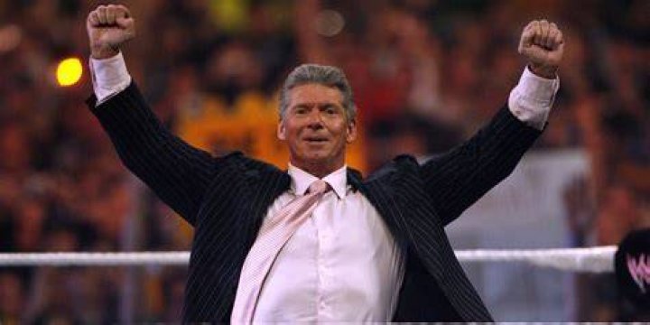 Vince McMahon leaping off a stage Cropped